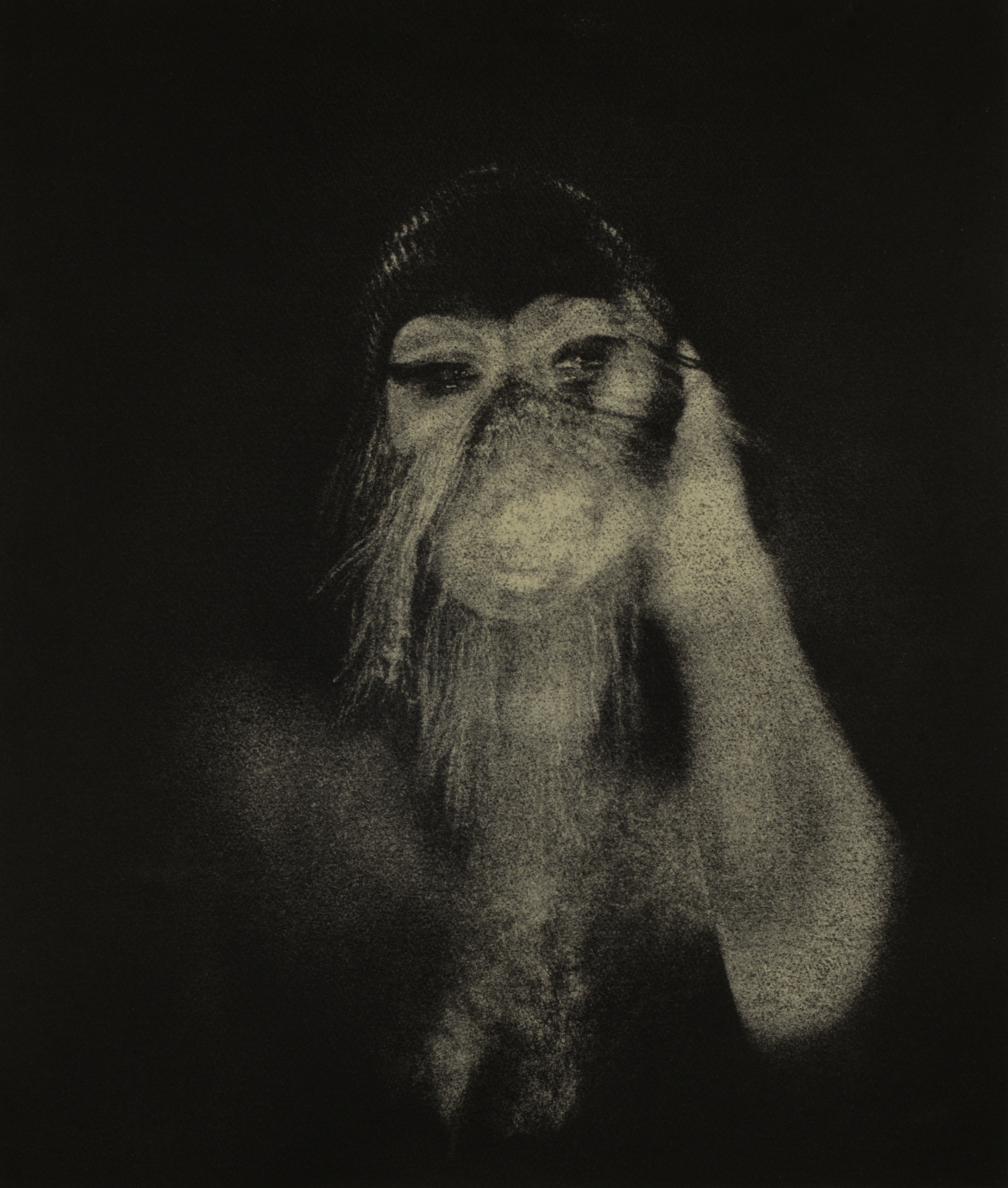 A distorted photo of a person in black and white.